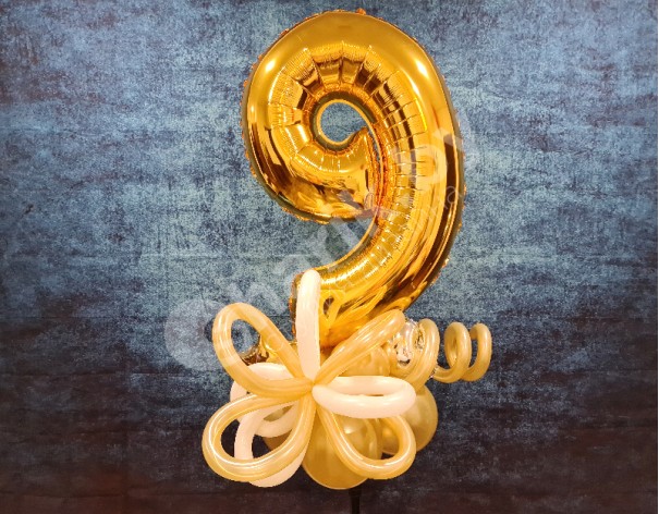 Золотая цифра "9"
